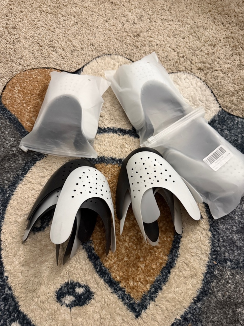 Black and white shoe crease protectors